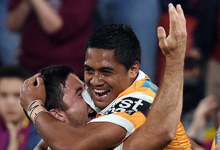 Anthony Milford of the Brisbane Broncos and teammate Ben Hunt celebrate