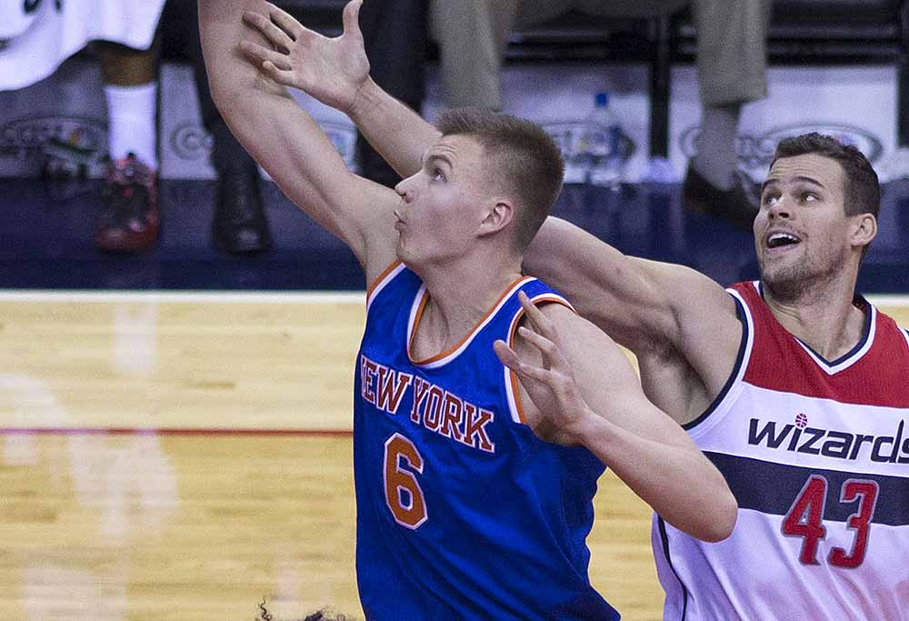 "Kristaps Porzingis and Kris Humphries" by Keith Allison from Hanover, MD, USA - . Licensed under CC BY-SA 2.0 via Commons -