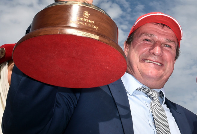 Darren Weir with the 2015 Melbourne Cup (AAP/Julian Smith)