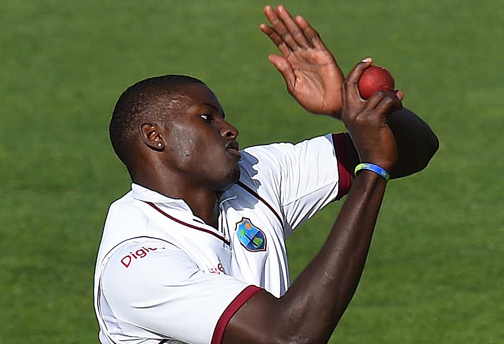 West Indies captain Jason Holder bowls