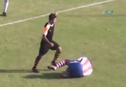 WATCH: Footballer disgracefully kicks opponent in the head