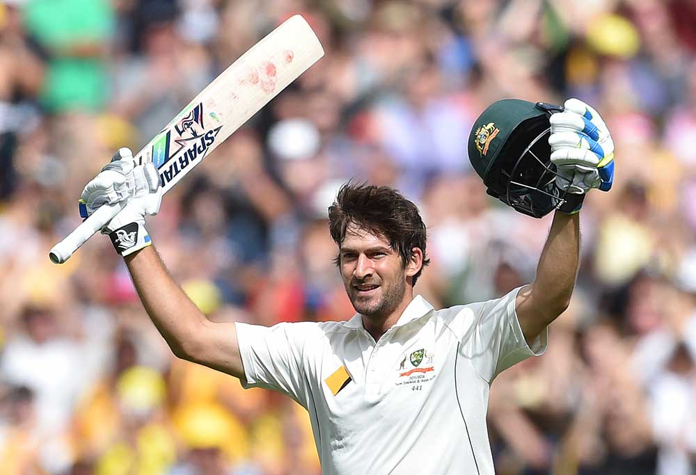 Australia's Joe Burns celebrates scoring a century