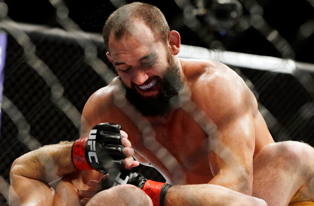 Johny Hendricks punches Georges St. Pierre