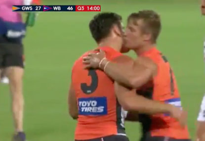 WATCH: Coniglio and Palmer share a kiss on the field