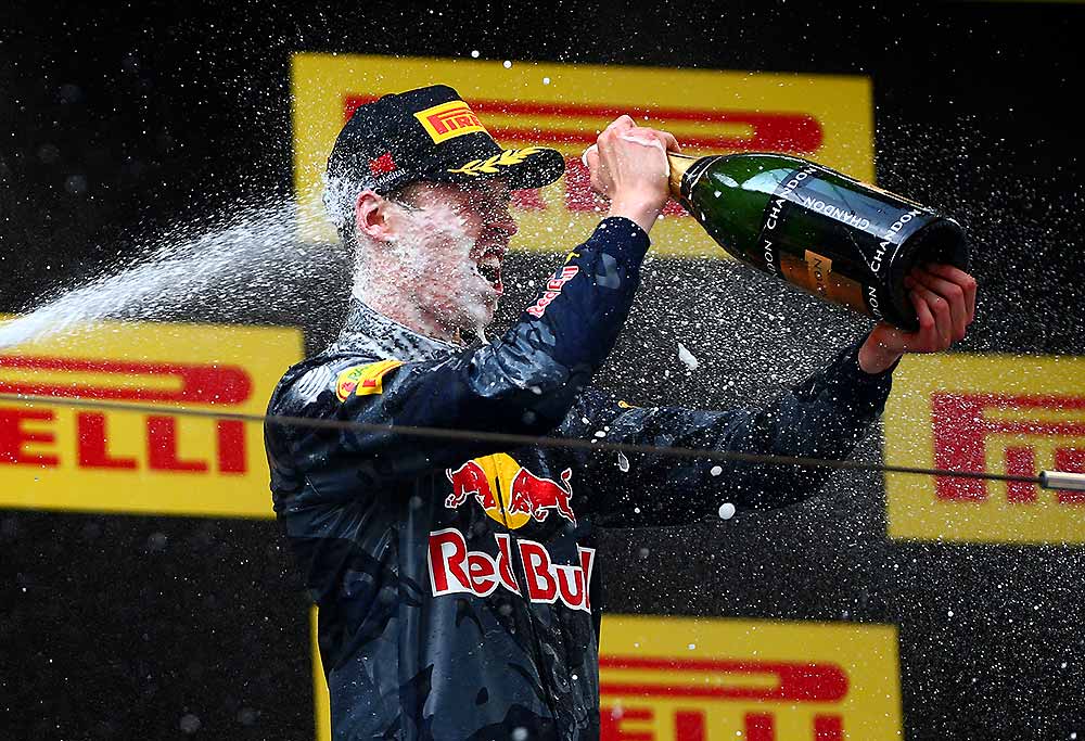 Daniil Kvyat gets sprayed with champagne