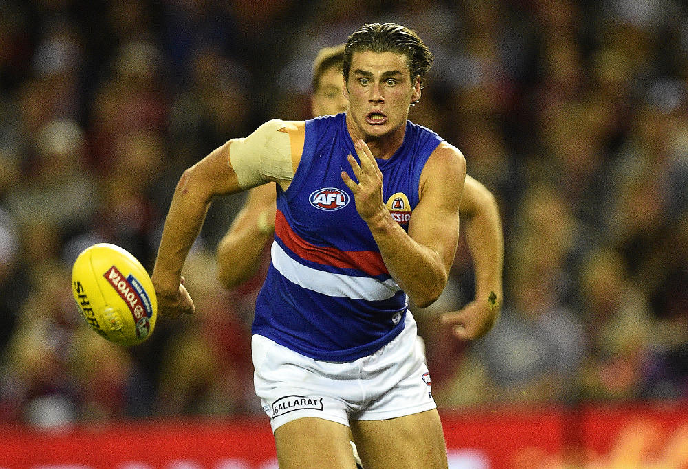 Tom Boyd chases ball