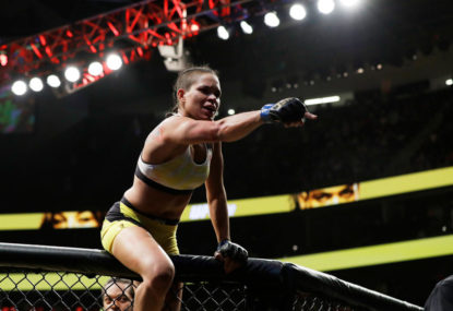 Nunes becomes first women's dual champion at UFC 232