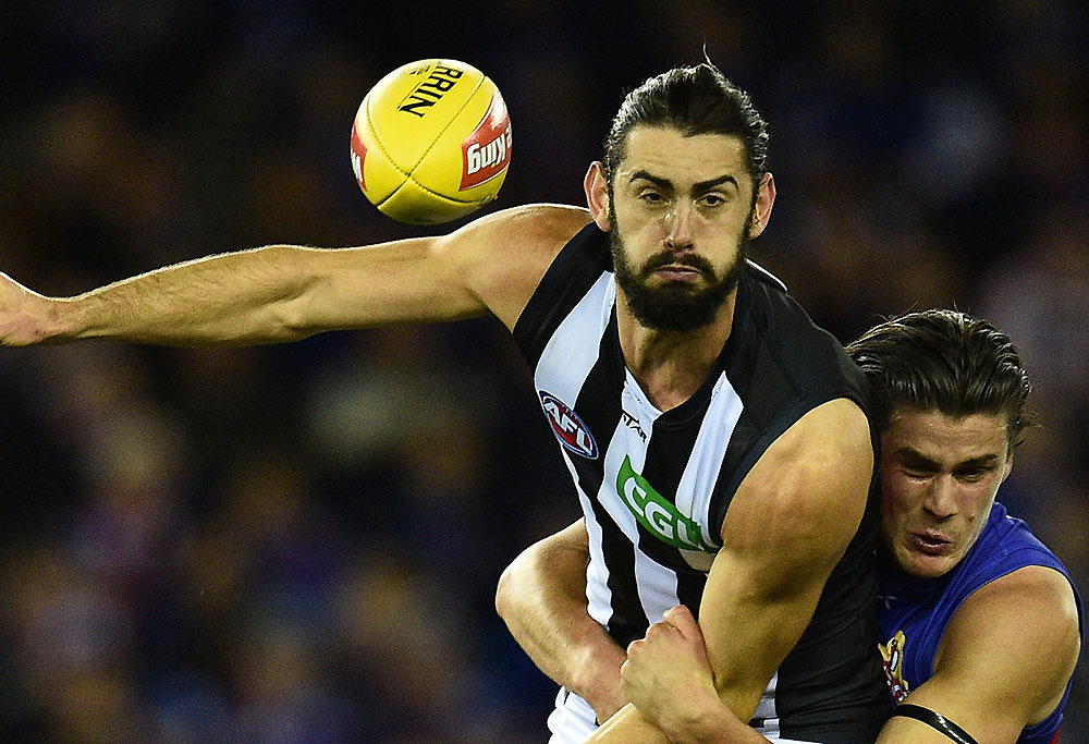 Brodie Grundy of the Magpies (left) and Matthew Boyd of the Bulldogs contest