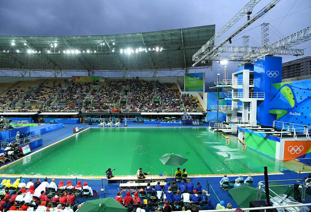 Green water is seen in the diving competition pool