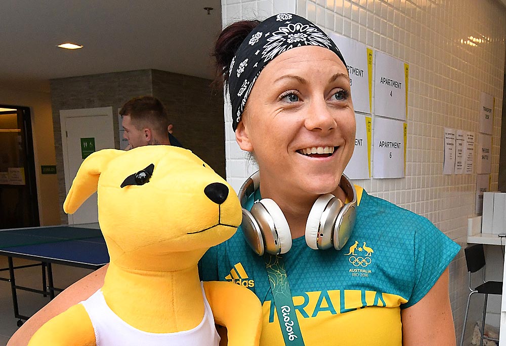 Australian boxer Shelley Watts holding an inflatable kangaroo