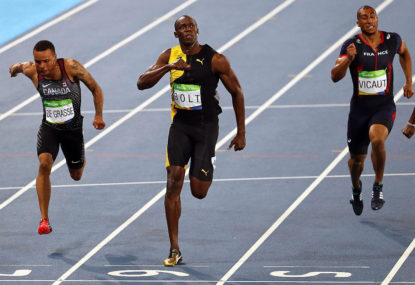 Usain Bolt wins third straight gold medal in men's 100m, Gatlin second