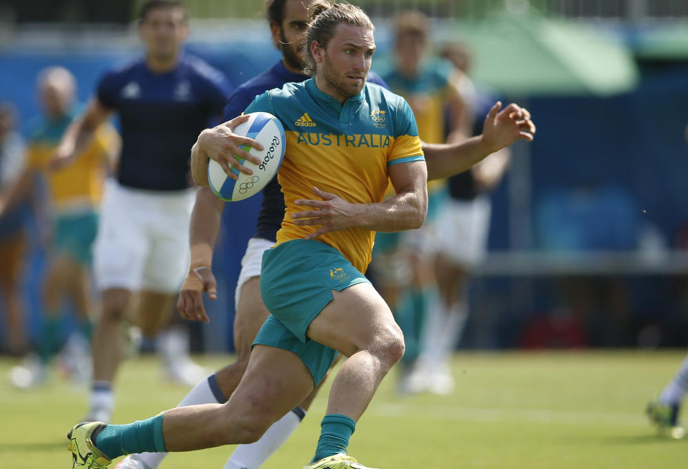 Lewis Holland playing rugby sevens