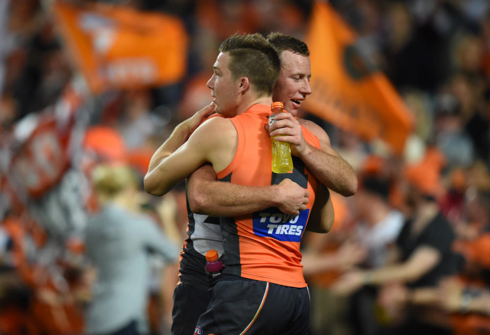 Steve Johnson and Toby Greene embrace in the AFL Finals 2016