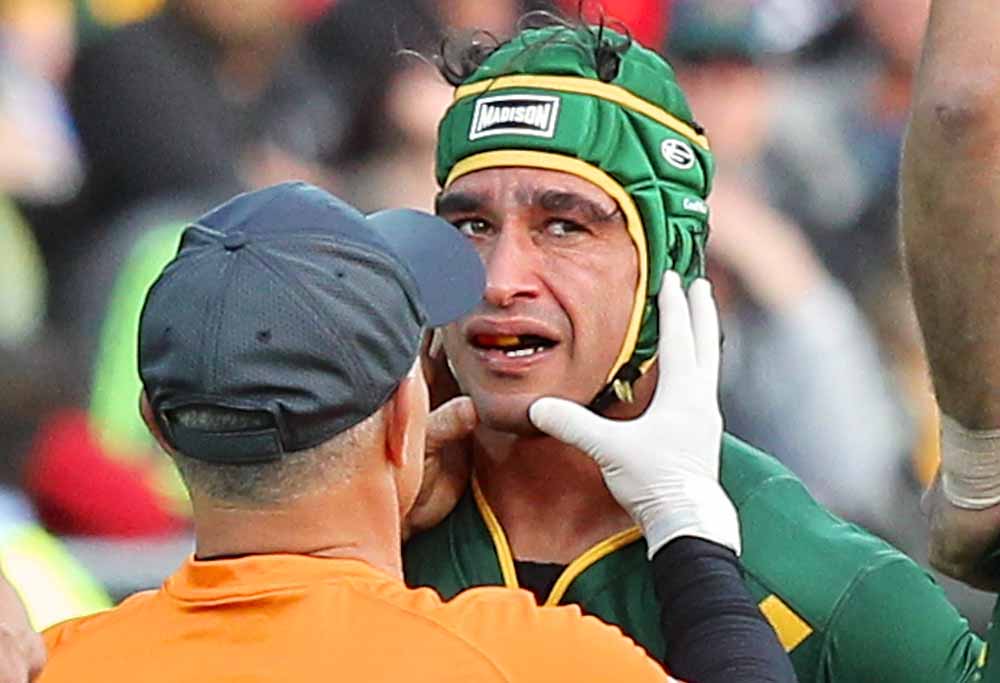 Johnathan Thurston for the Kangaroos is checked following a clash during the Test Match between the Australian Kangaroos and the New Zealand Kiwis at NIB Stadium in Perth, Saturday, Oct 15, 2016. (AAP Image/Richard Wainwright) 