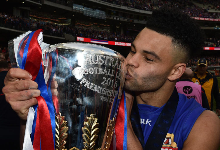 Jason Johannisen kisses the AFL Premiership Cup