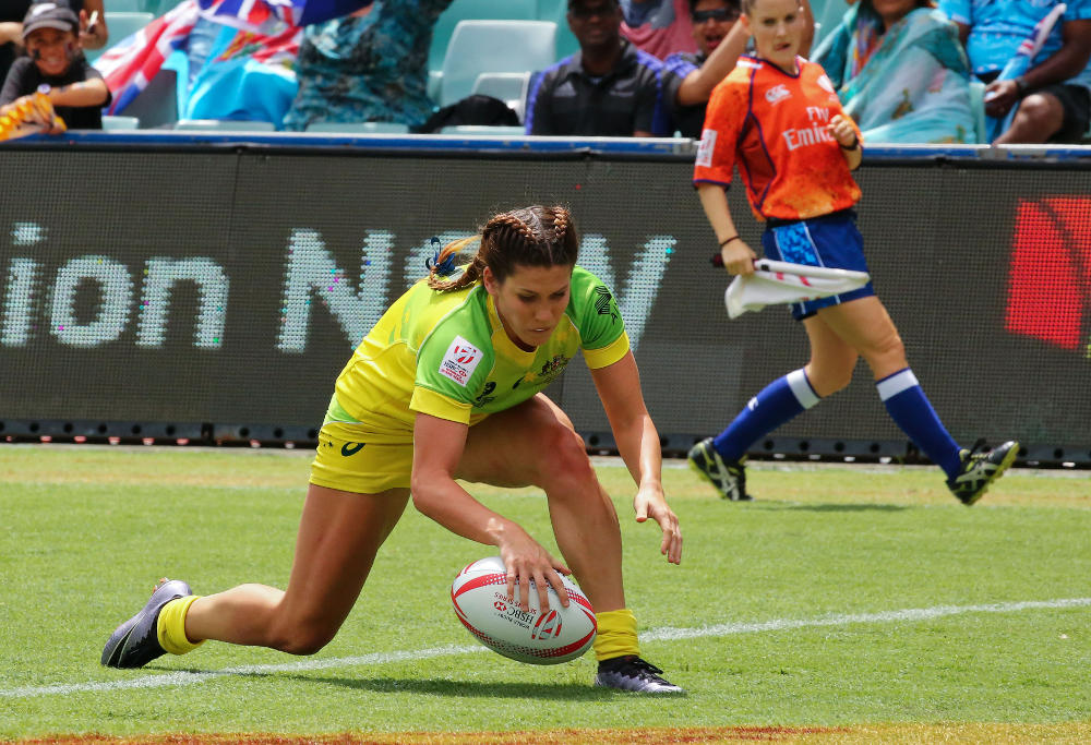 Australian Womens 7s player Charlotte Caslick scores at the Sydney 7s