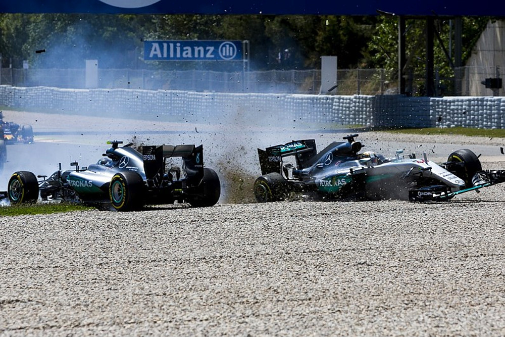 Lewis Hamilton and Nico Rosberg collide at the Spanish GP, causing both cars to be retired.