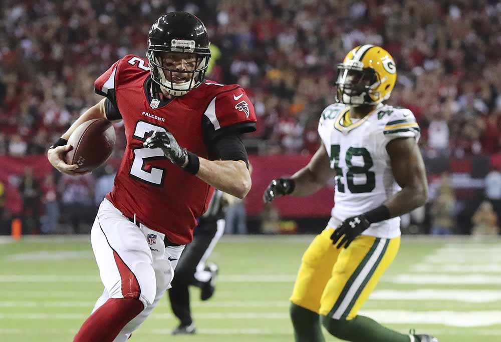 Atlanta Falcons' Matt Ryan runs for a touchdown during the first half of the NFL football NFC championship game against the Green Bay Packers, Sunday, Jan. 22, 2017, in Atlanta. (Curtis Compton/Atlanta Journal-Constitution via AP)