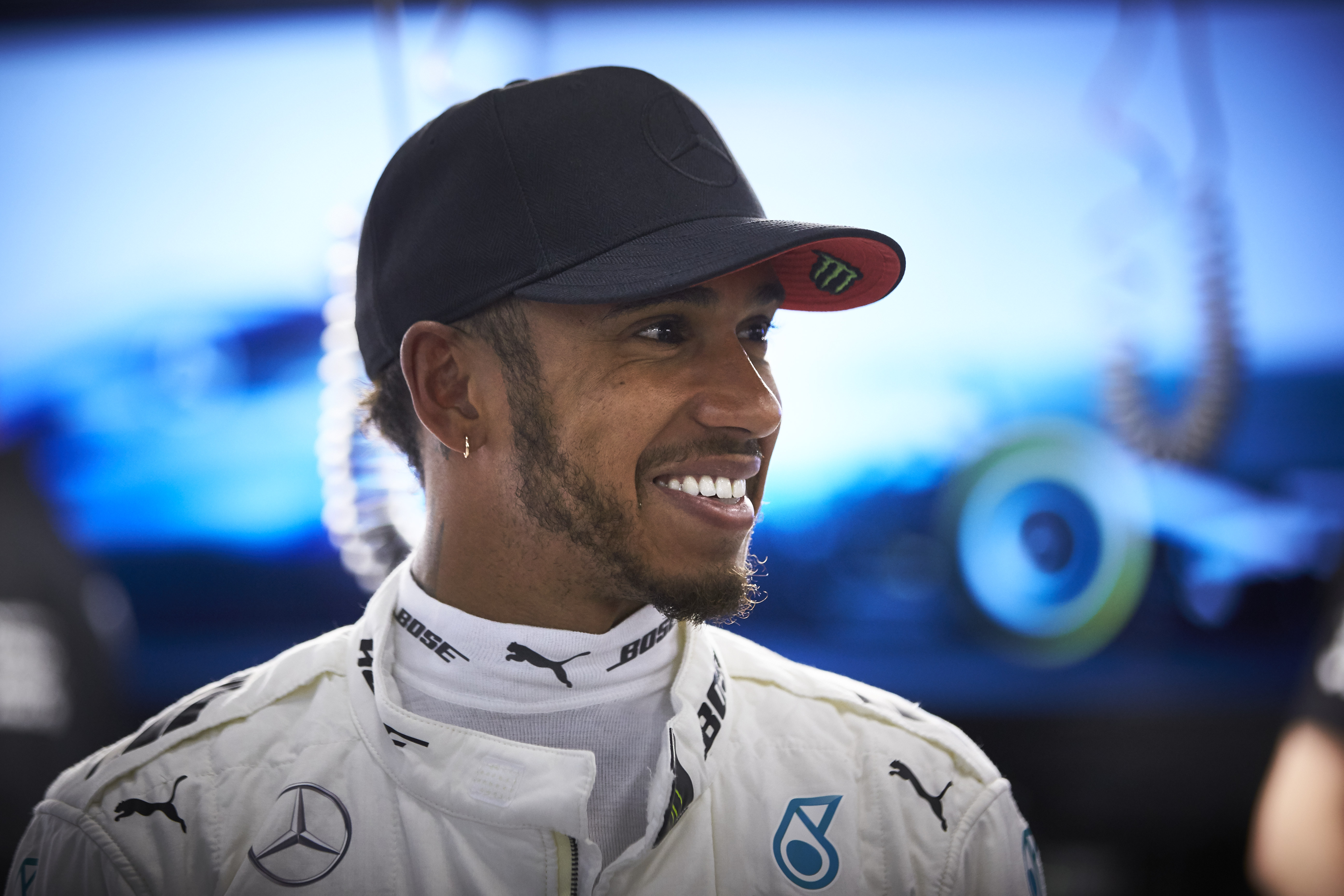 Lewis Hamilton smiles