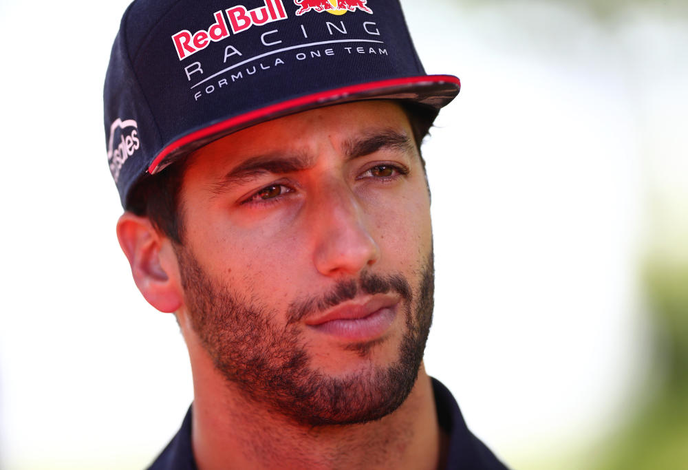 Formula One driver Daniel Ricciardo, of Red Bull, is interviewed by the media.