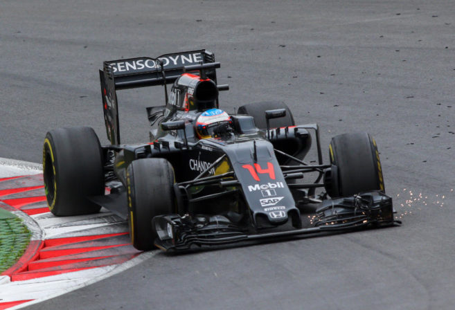 Fernando Alonso turns a corner in his McLaren-Honda Formula One car at the Austrian Grand Prix.
