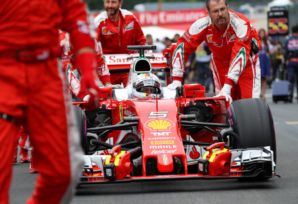 Sebastian Vettel's Formula One visits the Ferrari pit lane at Austria's Grand Prix.