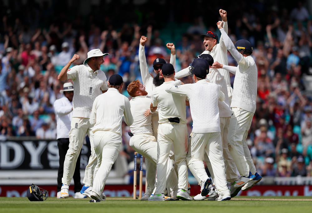 England's players celebrate after Moeen Ali scores a hat trick to get the wicket of South Africa's Morne Morkel to win the test match on the fifth day of the third test match between England and South Africa at The Oval cricket ground in London, Monday, July 31, 2017.