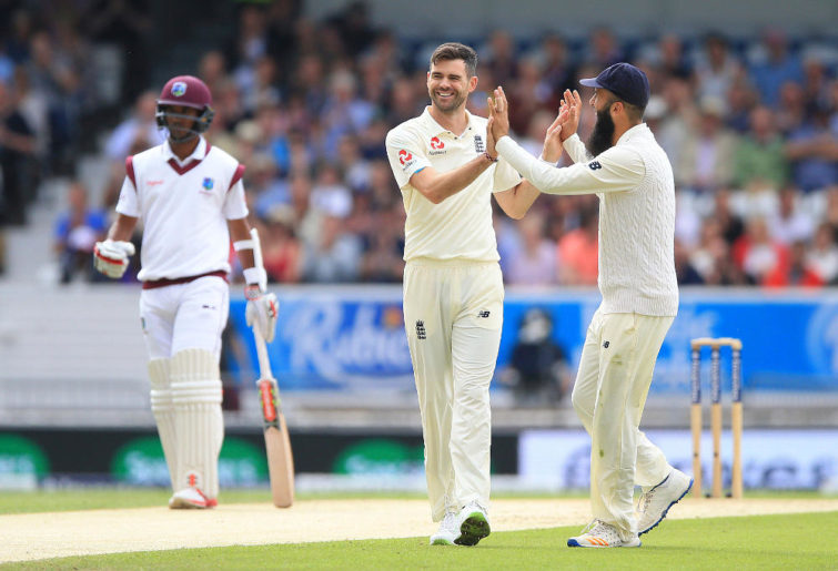 England's James Anderson (centre) celebrates with Moeen Ali after taking the wicket of West Indies Devendra Bishoo during day two of the the second Investec Test match at Headingley, Leeds. PRESS ASSOCIATION Photo. Picture date: Saturday August 26, 2017. See PA story CRICKET England. Photo credit should read: Nigel French/PA Wire.