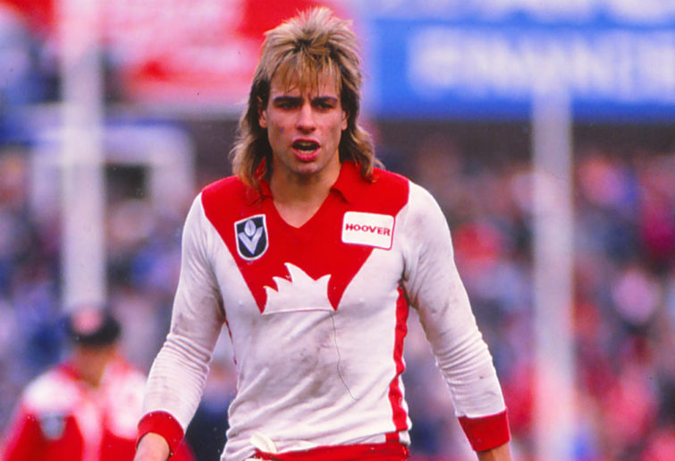 Warwick Capper playing for the Sydney Swans