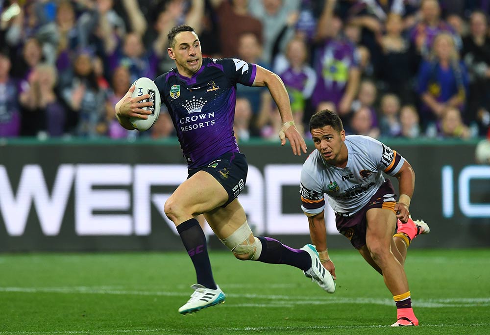 Billy Slater breaks through the Broncos to score a try in the first NRL Preliminary final