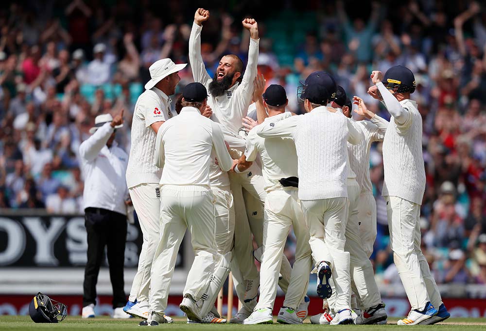 England's Moeen Ali lifted up by his team mates