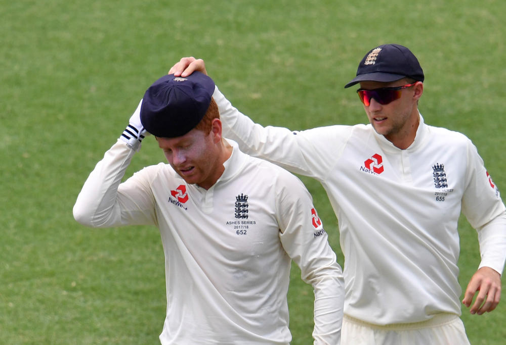 England wicketkeeper Jonny Bairstow (left) is seen with England Captain Joe Root (right) on Day 5 of the First Ashes Test match between Australia and England at the Gabba in Brisbane, Monday, November 27, 2017.