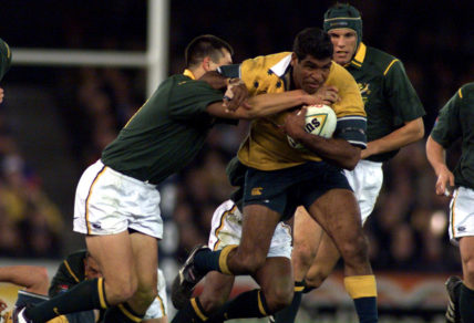 Jim Williams for Australia attempts to break a tackle