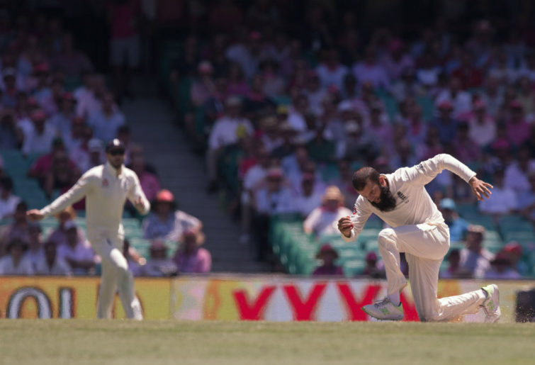 Moeen Ali of England takes a catch off his bowling to dismiss Australia's Steve Smith 