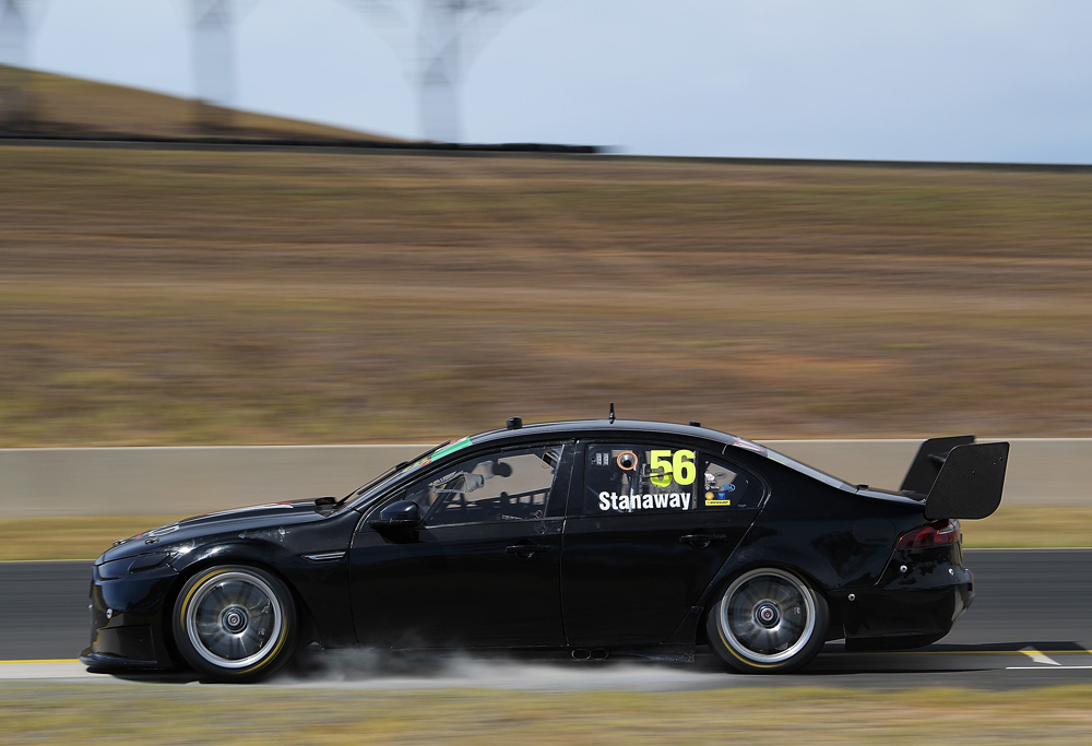 Richie Stanaway tests his all-black Ticktum Racing car in Sydney.