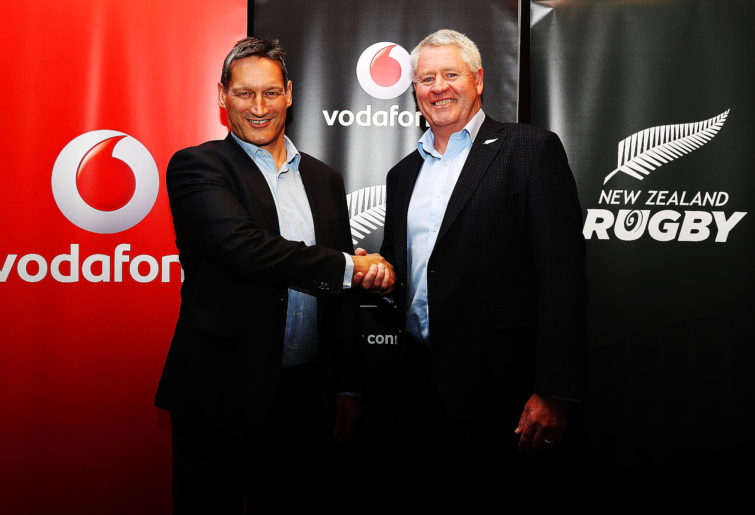 Vodafone Chief Executive Russell Stanners shakes hands with New Zealand Rugby CEO Steve Tew during a New Zealand All Blacks sponsorship Announcement at Eden Park on May 22, 2017 in Auckland, New Zealand. New Zealand Rugby have signed a four-year partnership with Vodafone New Zealand.