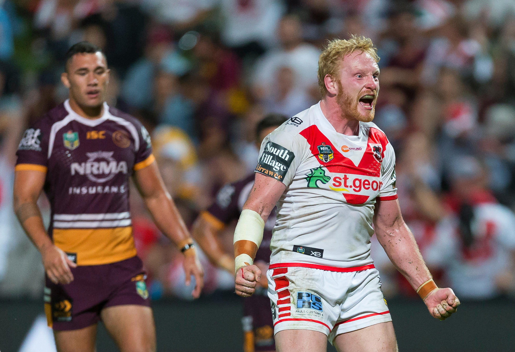 James Graham celebrates a try for the Dragons