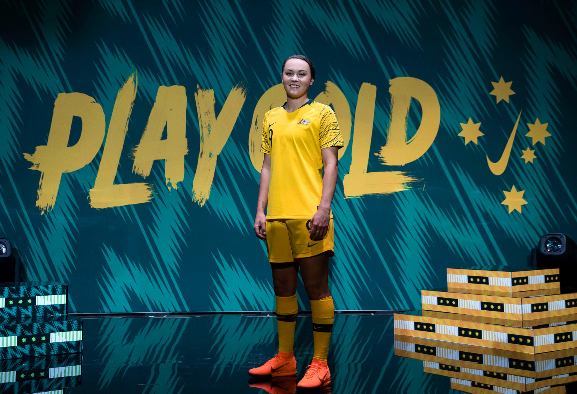 Caitlin Foord shows off the 2018 World Cup Matildas' jerseys.