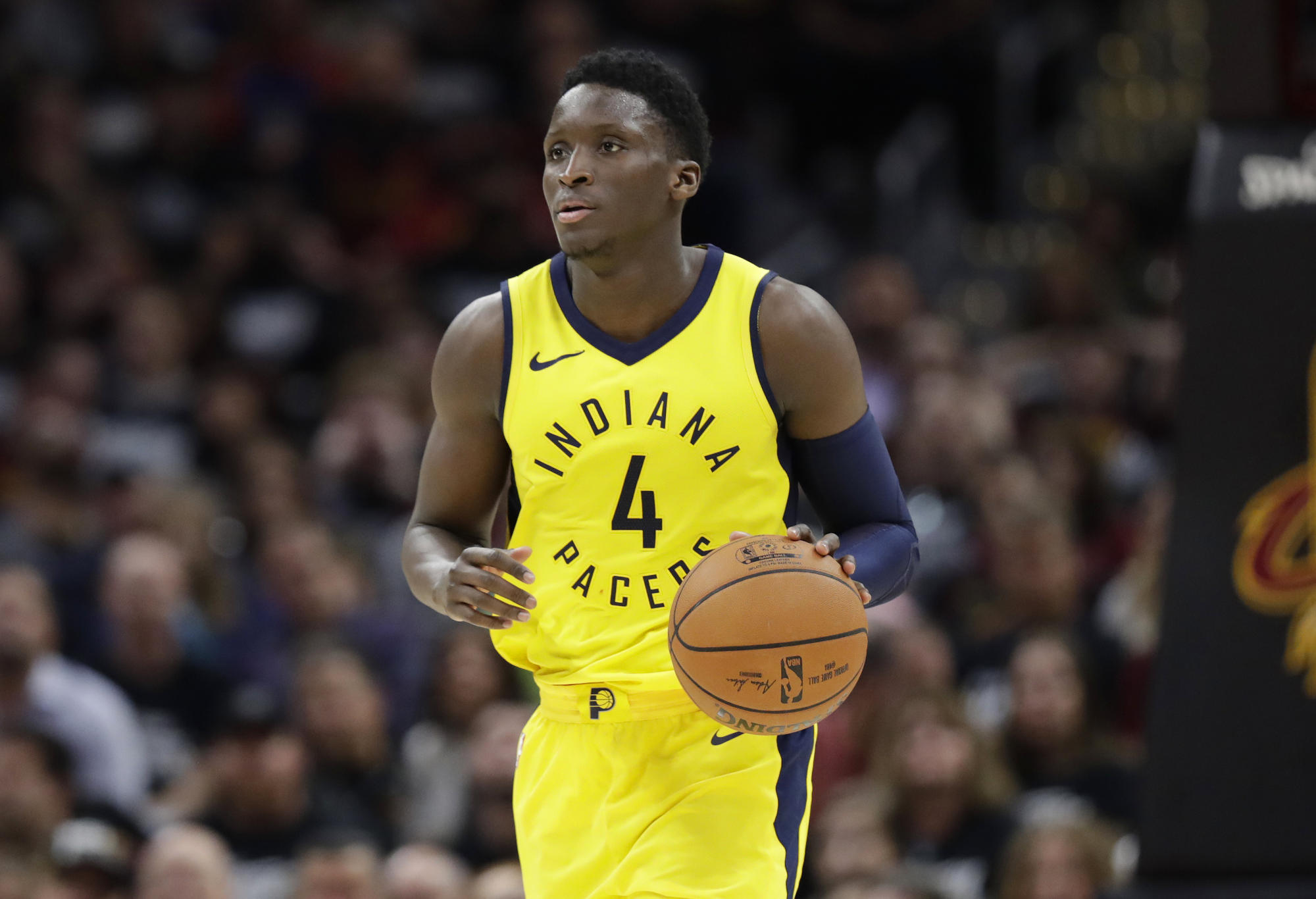 Victor Oladipo dribbles the ball