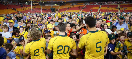 Wallaby players sign autographs for fans