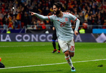 Spain defeat determined Iran to move closer to knockout rounds