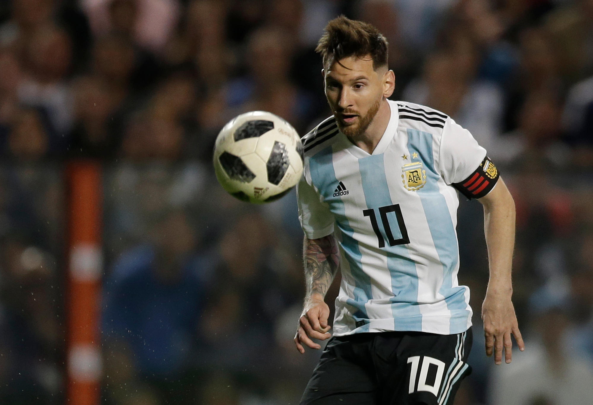 Argentina's Lionel Messi controls the ball during a friendly soccer match between Argentina and Haiti at the Bombonera stadium in Buenos Aires, Argentina, Tuesday, May 29, 2018.