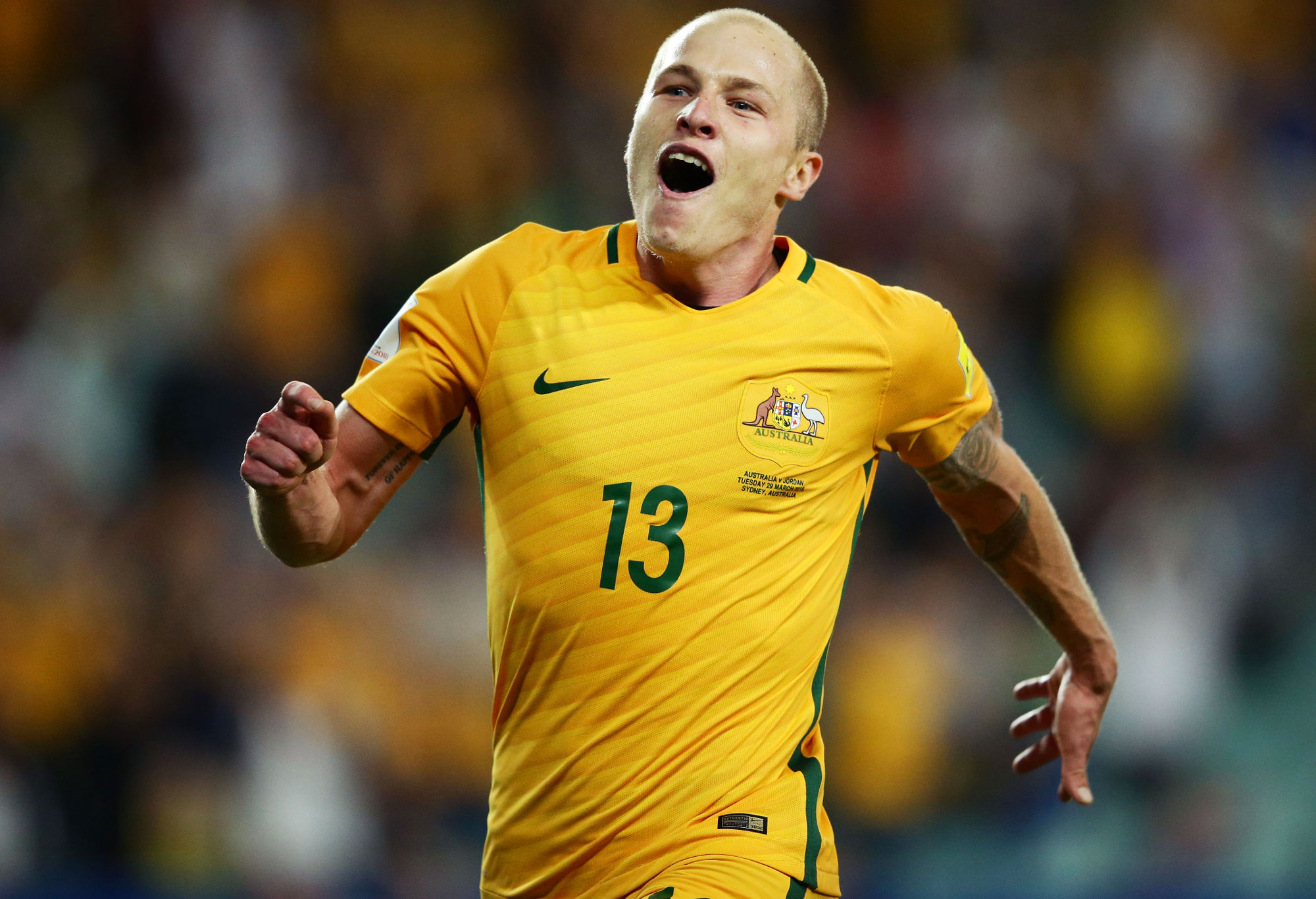 Aaron Mooy celebrates for the Socceroos