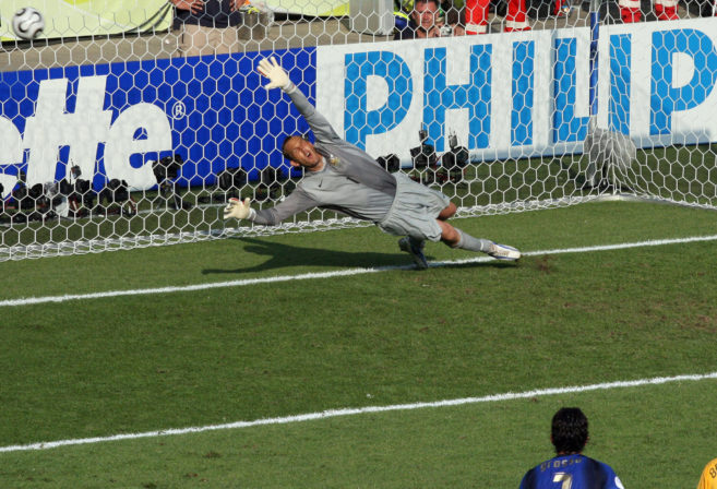 Mark Schwarzer dives in an attempt to top a penalty. 2006 World Cup.