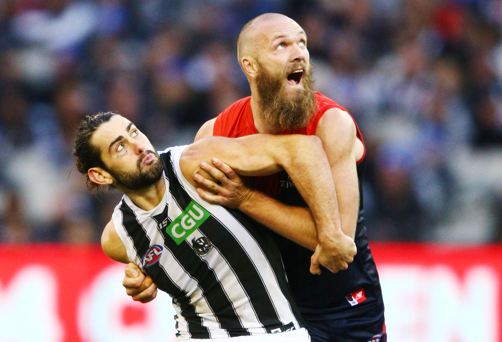 Brodie Grundy and Max Gawn fight it out in the ruck