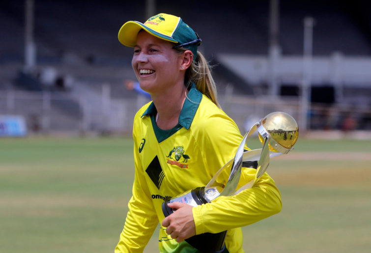 Australia's captain Meg Lanning with the trophy smiles after winning the final of Women's cricket T20 Triangular Series.