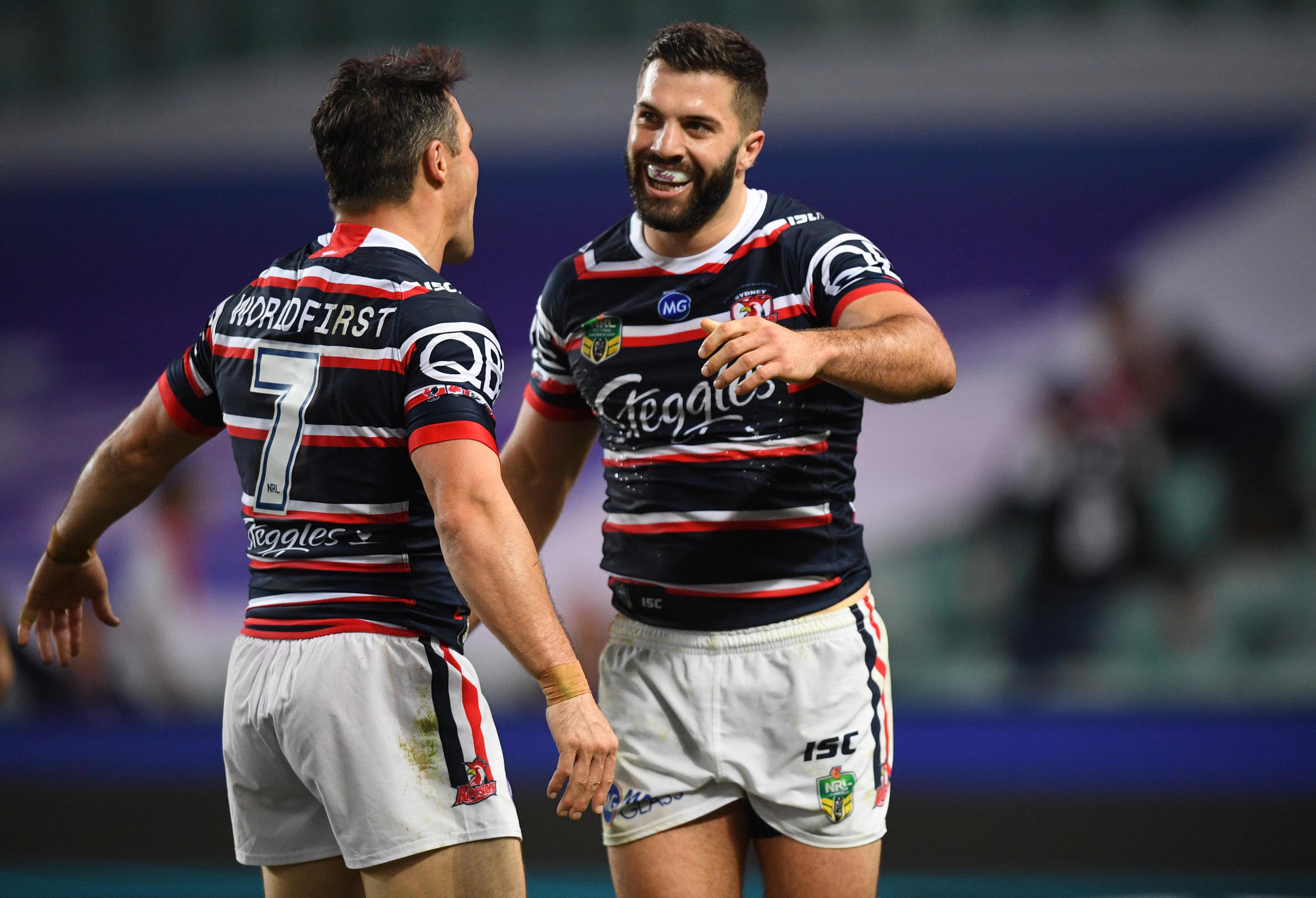 James Tedesco of the Roosters reacts after scoring a try against the Dragons.