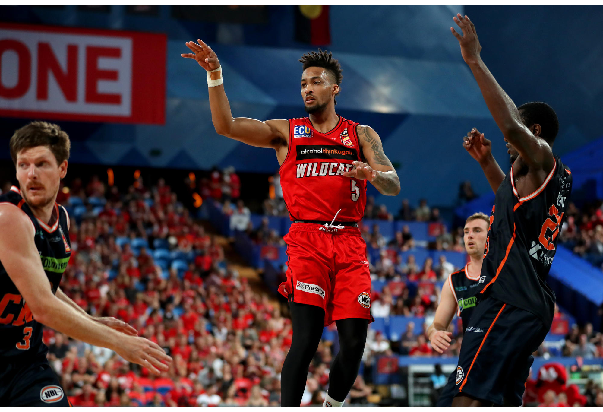 Jean-Pierre Tokoto of the Wildcats in action against the Cairns Taipans.