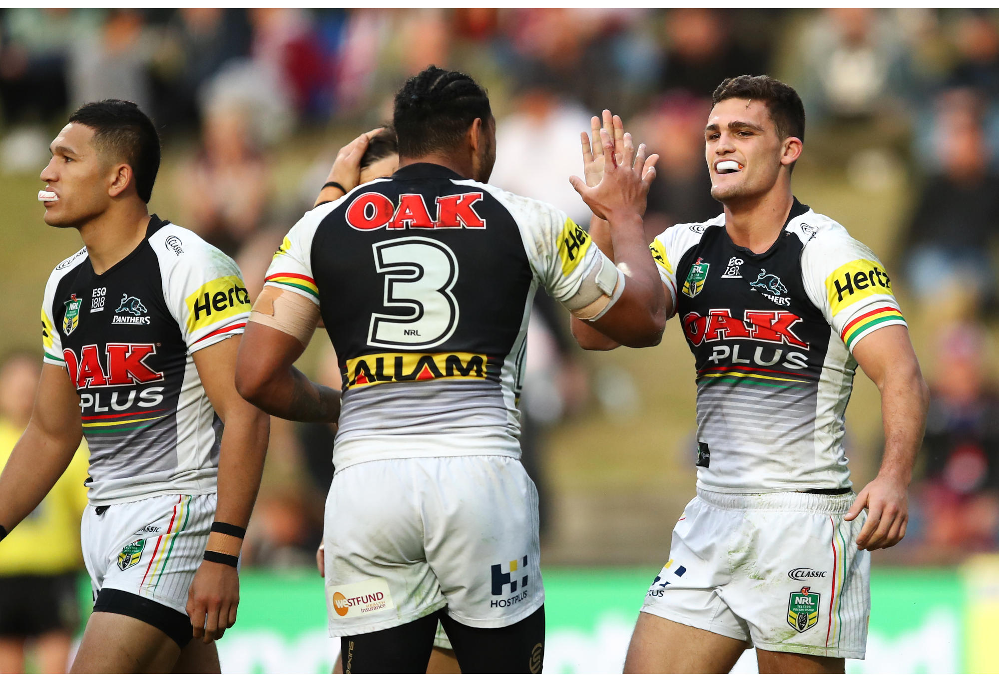Nathan Cleary of the Panthers celebrates with team mates after scoring a try to snatch victory against the Sea Eagles.