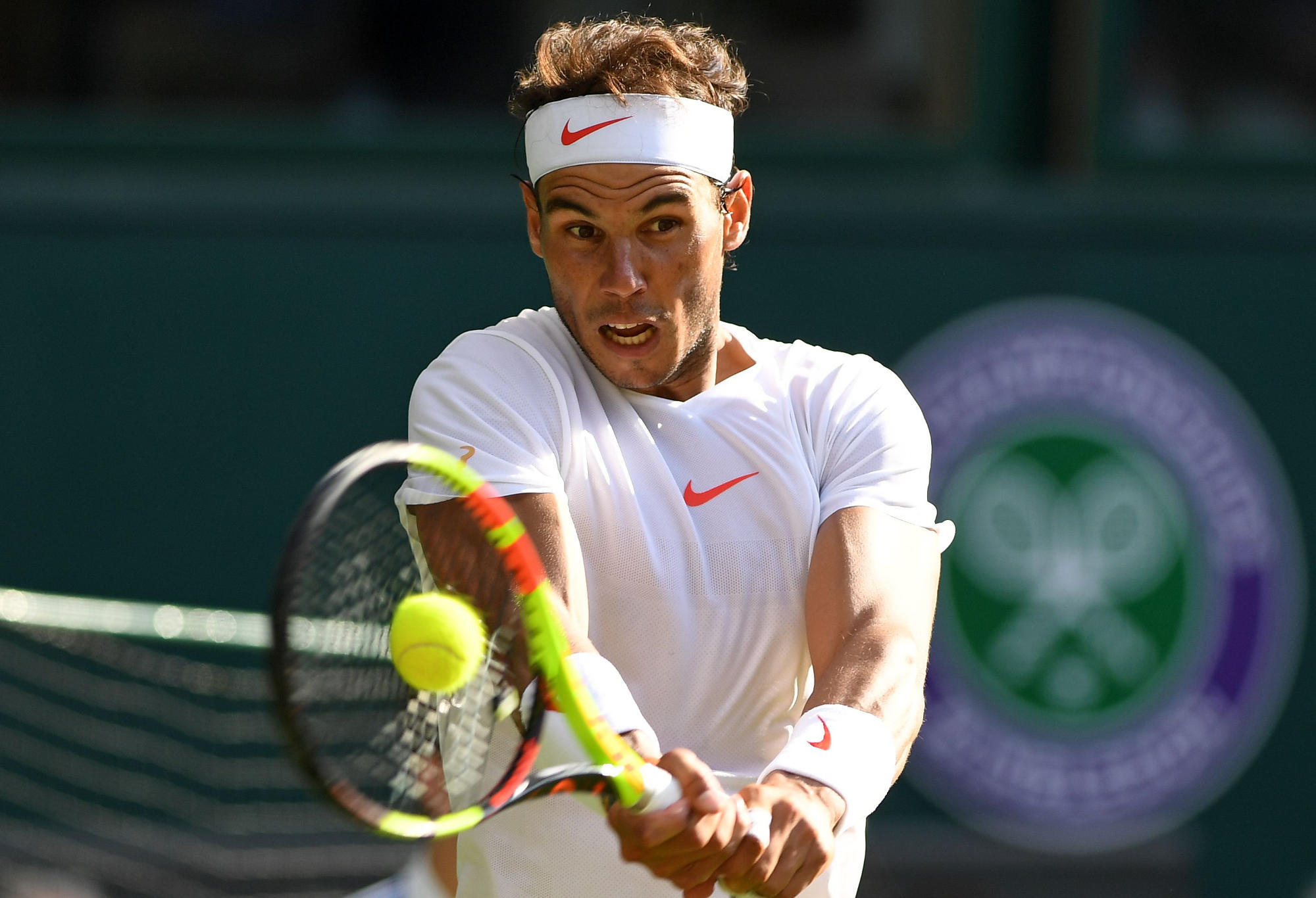 Rafael Nadal hits at Wimbledon.